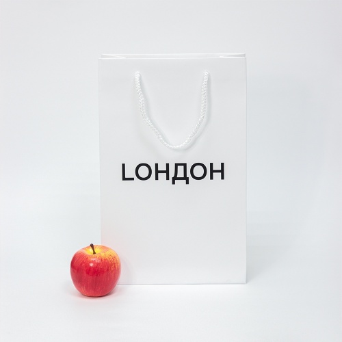 Пакеты бумажные 23х36х10см, цвет - белый, материал - мелованная бумага, ламинация - матовая, ручки - шнур, фото 1 (вид спереди)