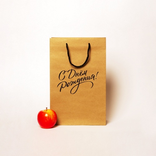 Пакеты бумажные 23х36х10см, цвет - коричневый, материал - плотный крафт, ламинация - без ламинации, ручки - шнур, фото 1 (вид спереди)